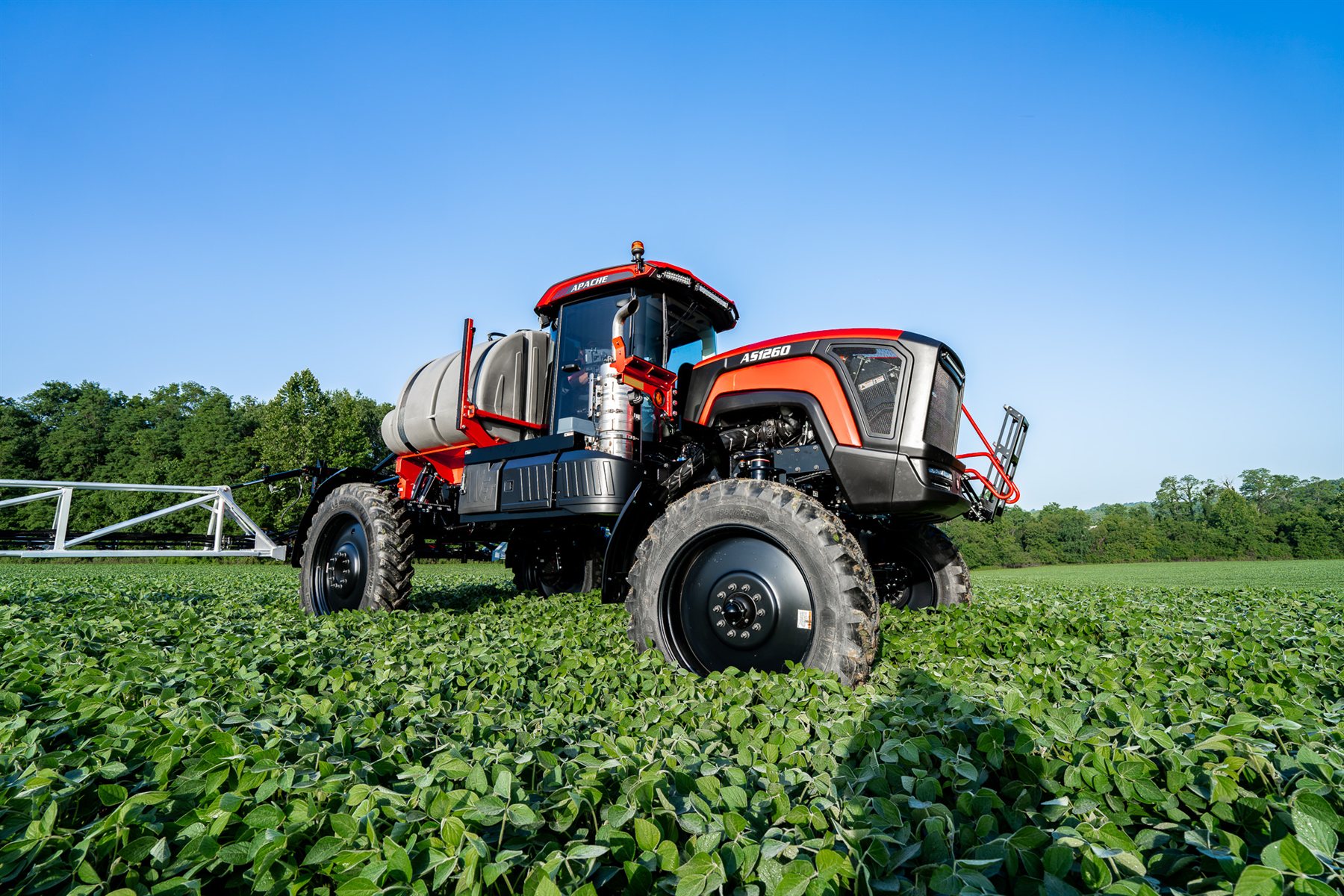 Apache AS1260 sprayer in a soybean field